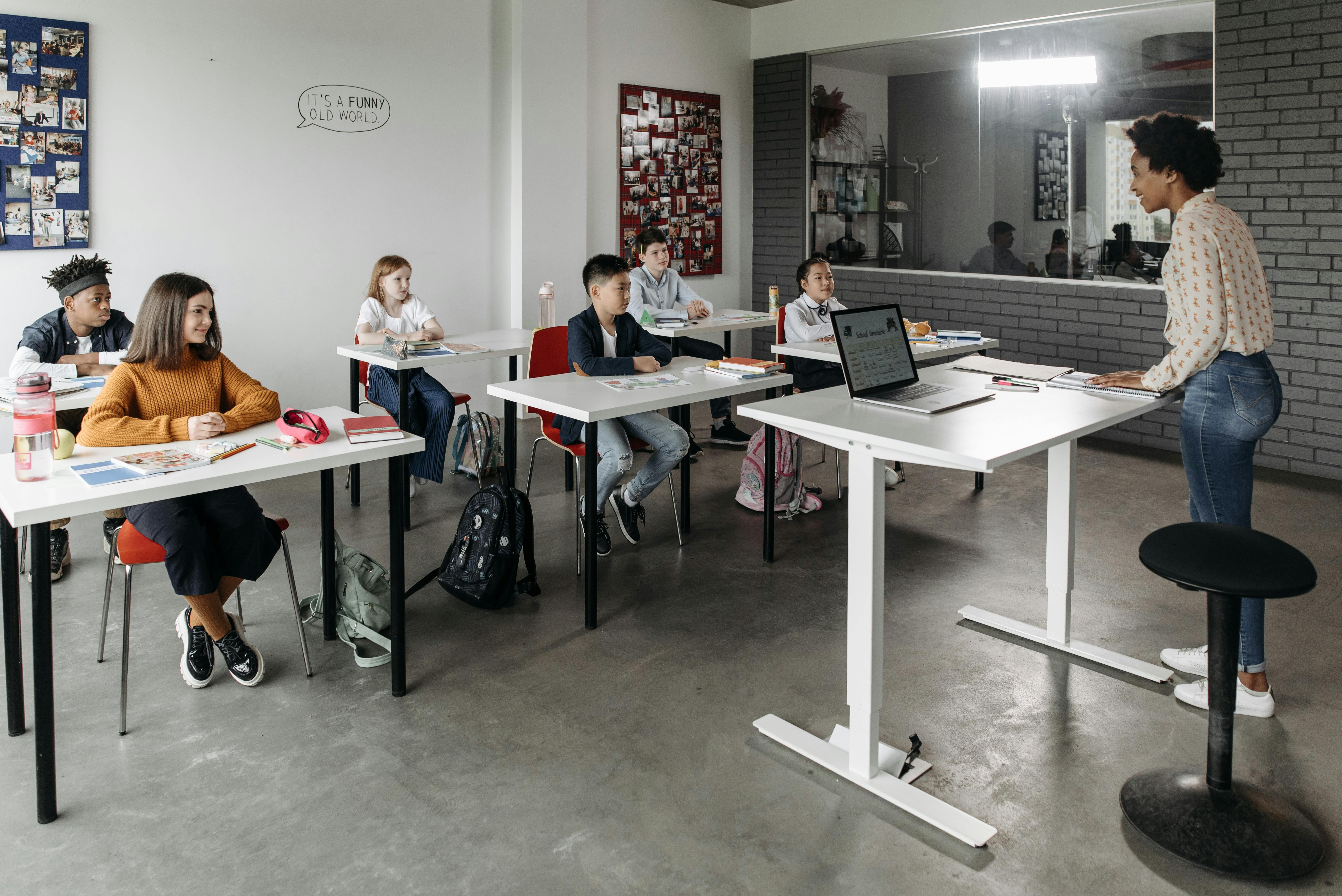 Diverse K-12 students facing grading bias challenges in traditional assessments